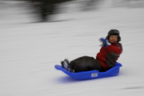 D speeding by on sled